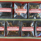 Seven Avatar-themed tea samples spread on a colorful cloth