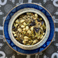 Teacup full of herbs and flowers