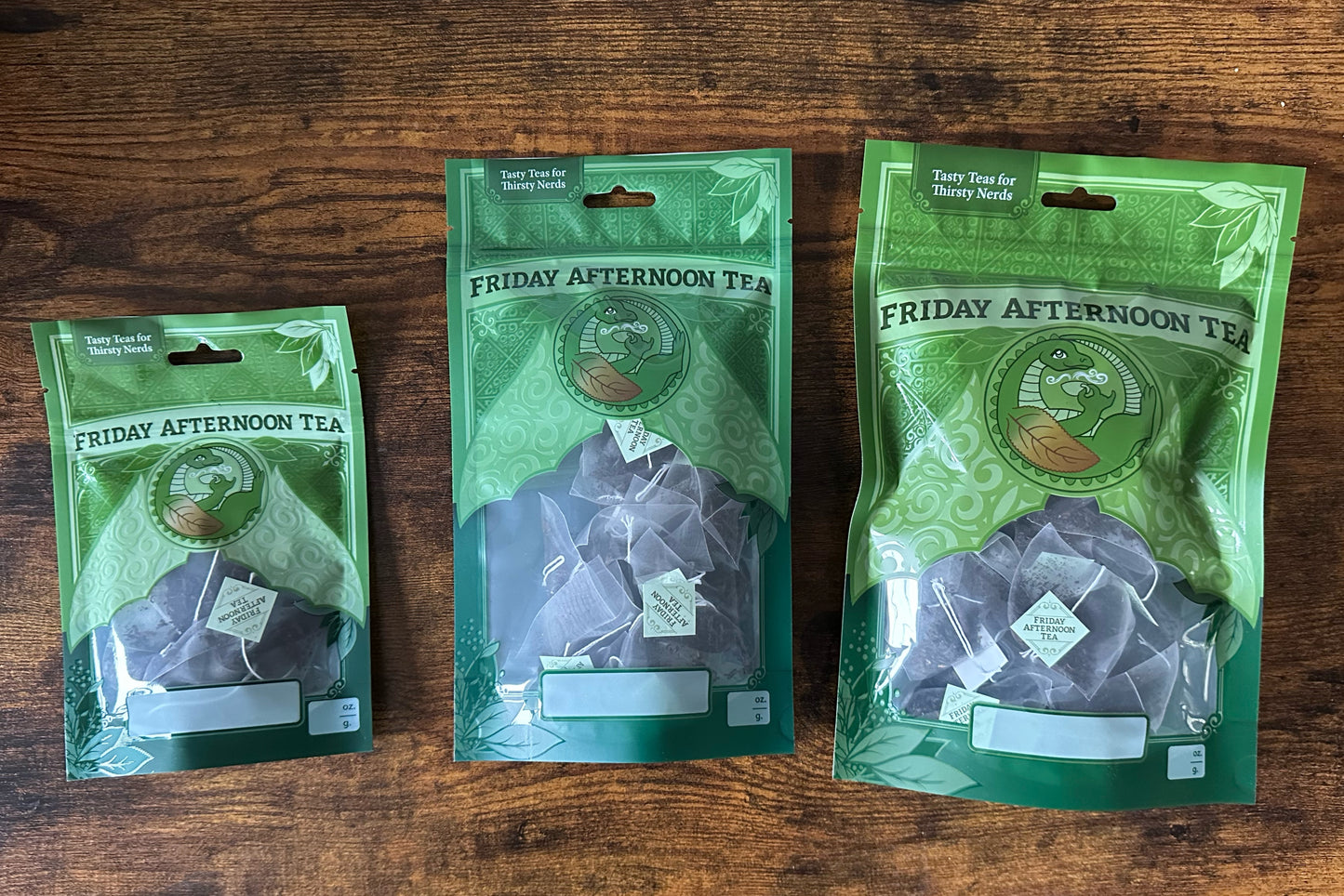 Three sizes of tea pouch full of teabags