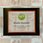 Studio Sampler packaging with a checkered background